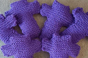 Purple knitted crosses